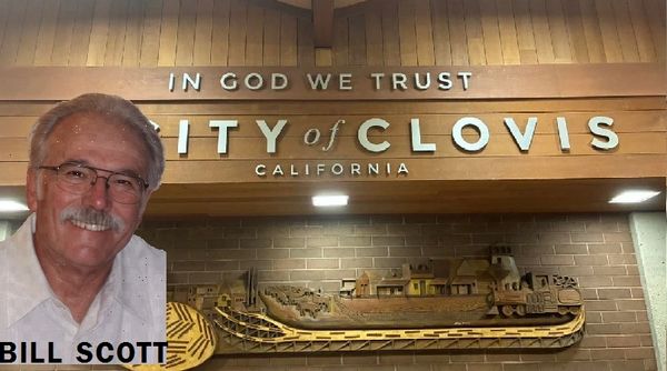 Bill Scott's photo superimposed on City of Clovis sign in California.