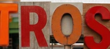 Letters arranged to spell 'ICENT' using different styles and materials.