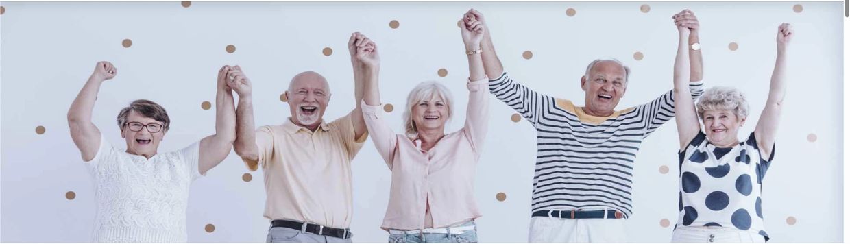 Happy elderly group holding hands and celebrating together.