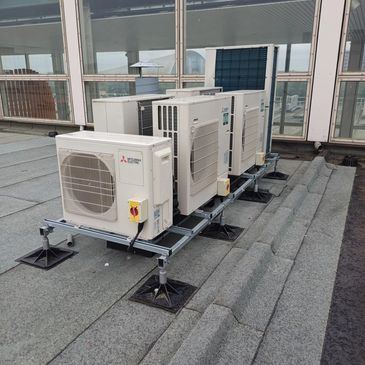 Multiple  Mitsubishi electric condensers on a Bigfoot framework . Milton Keynes