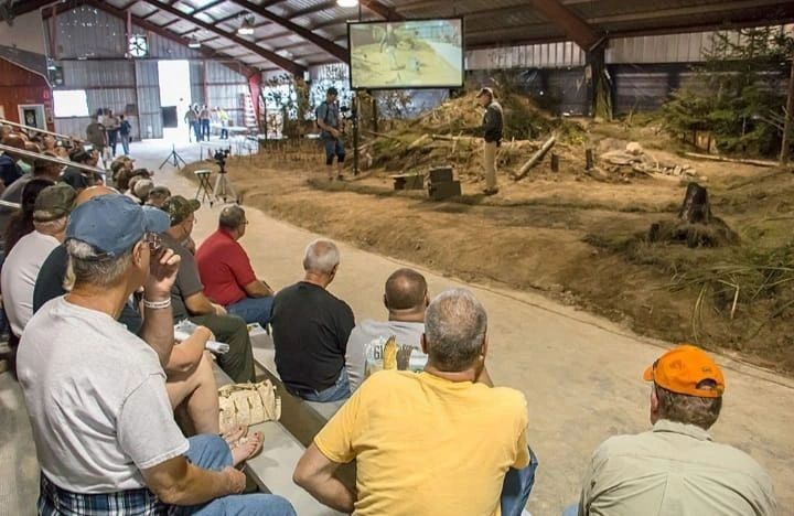 Ron Jones, owner of Rednecks Pride Outdoors, gives a lecture about cage trapping.. 
