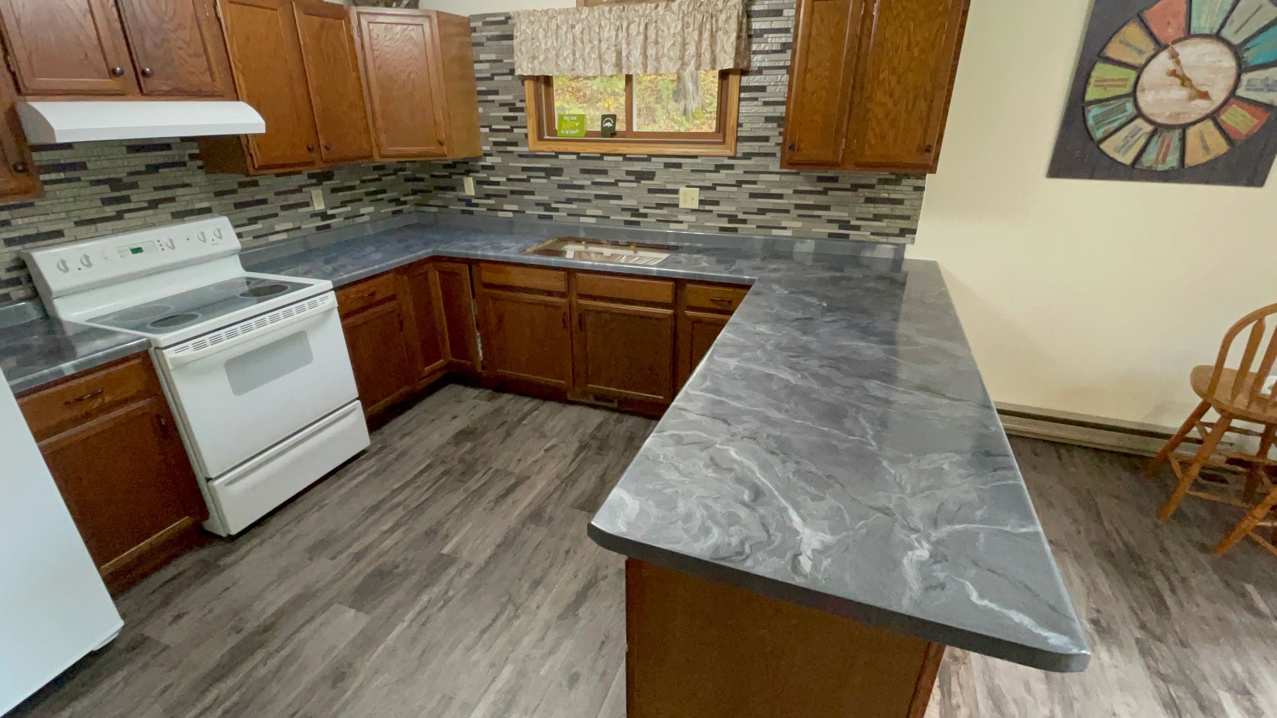 Tile Backsplash
Cabinet painting
epoxy countertops
epoxy bartops
epoxy floors
polyuria