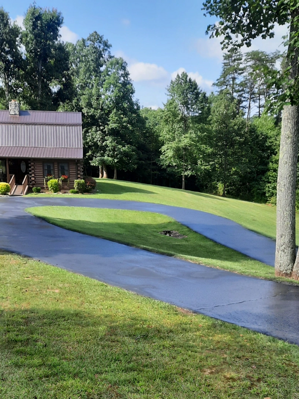 Freshly sealed asphalt driveway