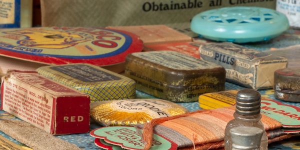A collection of tins from the Forgetmenot Archive of Australian Social History 