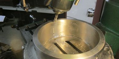 Using ball end mill to machine grease groove in bearing housing for Ross double planetary mixer.
