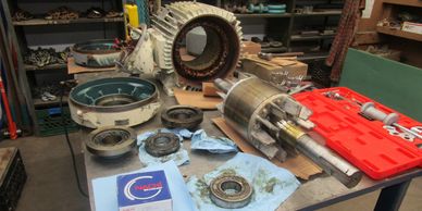 Heavy Duty Machine, Inc. installing new ball bearings in 40 HP motor on Ross double planetary mixer.