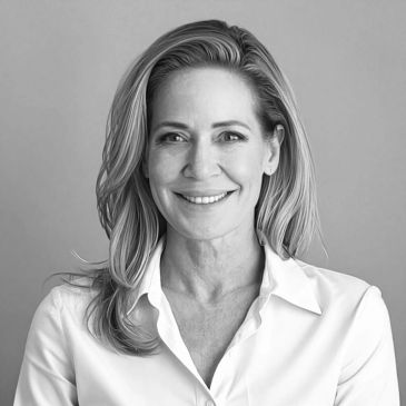 Smiling woman in a white shirt.