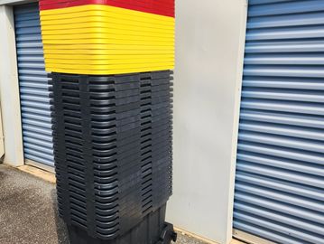 25 bins and lids with 1 moving dolly. 