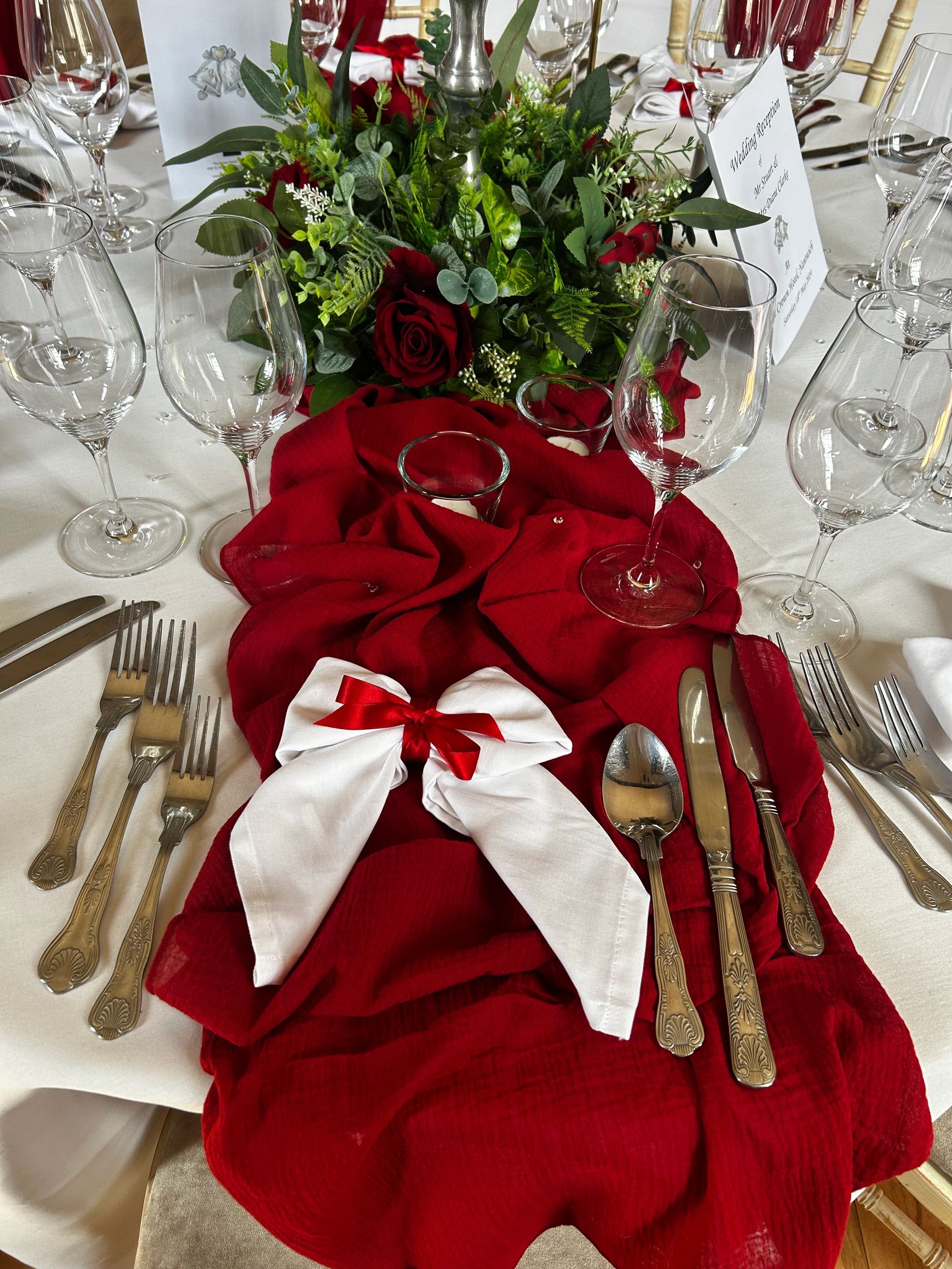 Red cheesecloth table runners