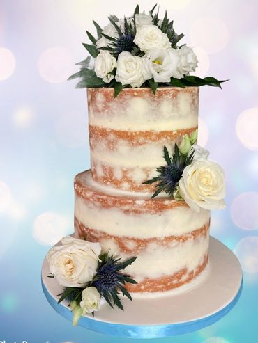 Semi naked Wedding cake with fresh flowers