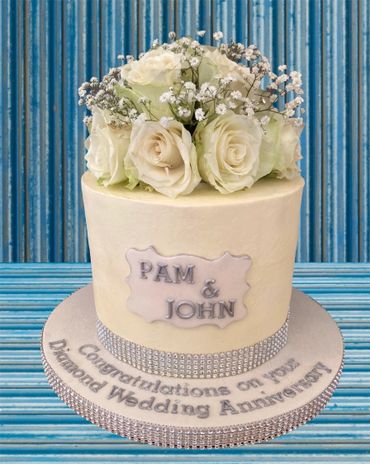 Diamond wedding anniversary cake buttercream with fresh flowers