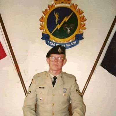 1989 at HQ & Sigs, old CFB Calgary,  Reginald receiving UNIMOG medal for UN Mission overseas to Iran