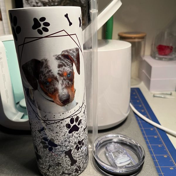 A personalised cup with a picture of a dog