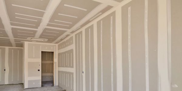 perfectly finished 20x10 drywalled room with a level 4 finish.