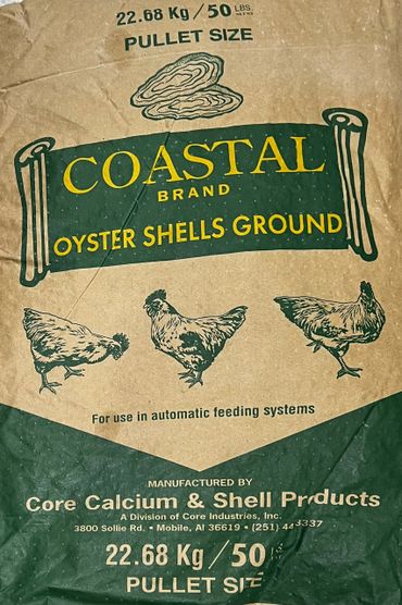 Bag of Coastal Brand oyster shells ground for poultry feed.