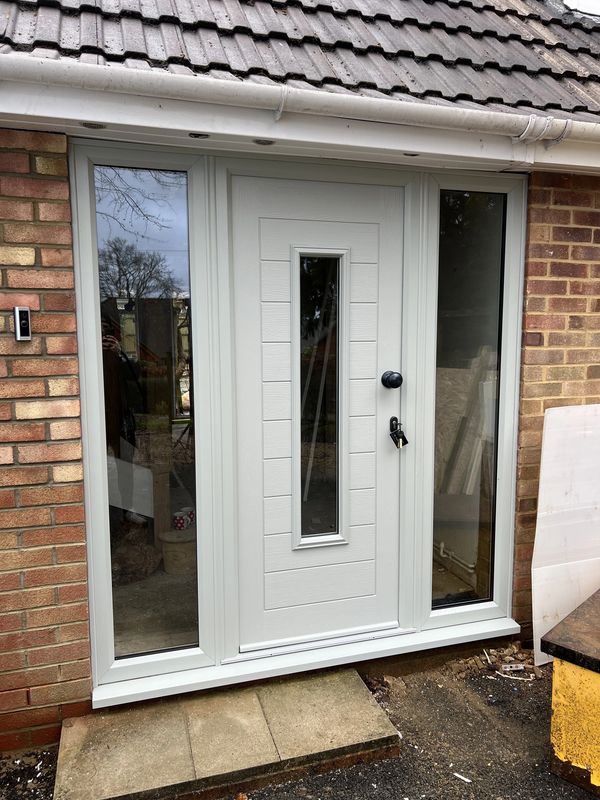 White front door with sidelights