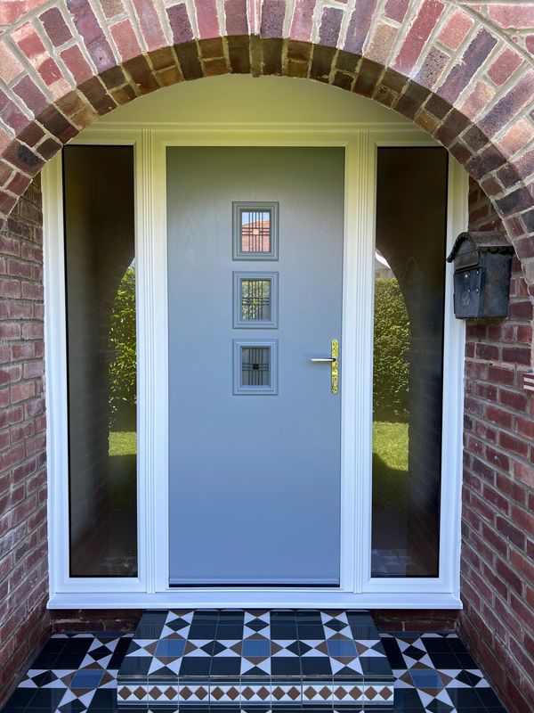Light blue composite door with two sidelights