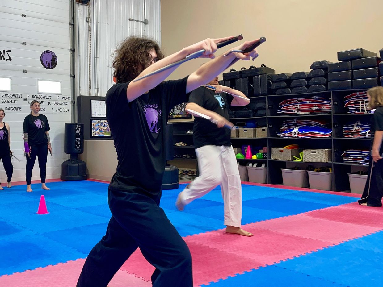 saijutsu student performing a powerful strike at douglas martial arts in moose jaw