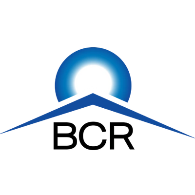 Blue mountain peak with a bright glowing sun behind it.