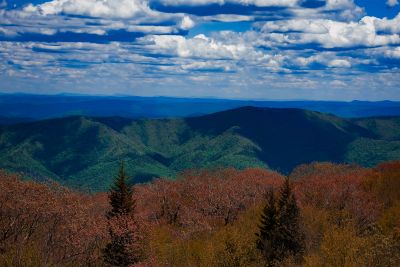 Appalachian mountain landscape photography print with rolling green ridgelines, blue sky, and clouds