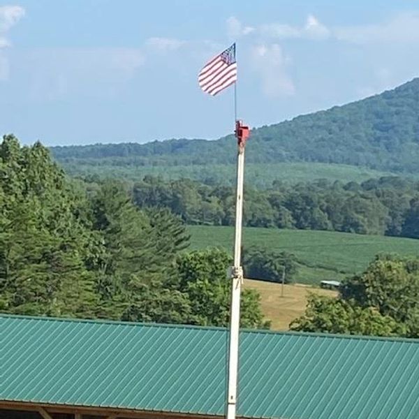 Picture of the American flag flying at the Well Guy's base of operations in Rocky Mount, VA.