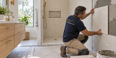 AI illustration: bathroom renovation with a worker in an RCN uniform.