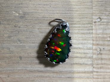 Ethiopian opal set with fine silver pendent.