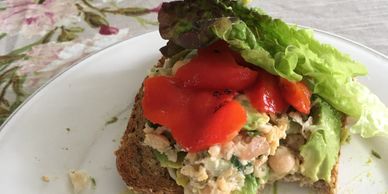 A plate with a sandwich on it