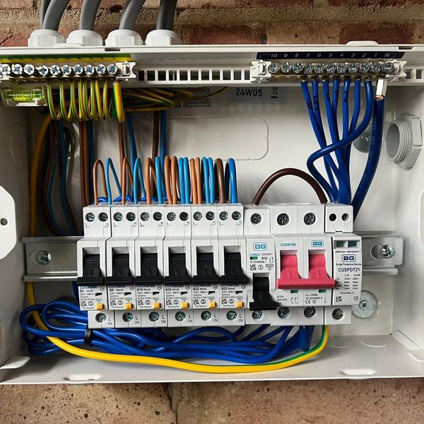 Electrical circuit breakers inside a distribution box.