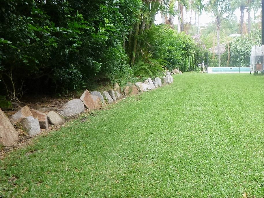 Line trimming and mowed with stripes