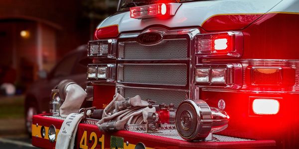 Front of a fire truck illustrating  discount  for first responders, veterans, churches, and non-prof