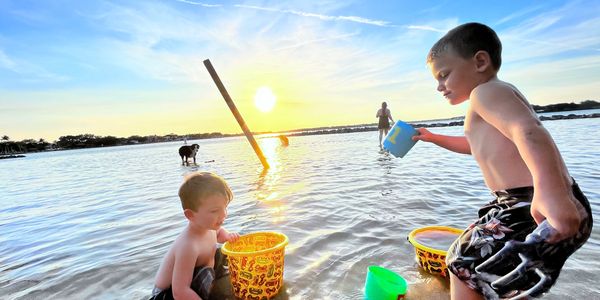 kids playing on beach, Jupiter Florida, boat cruise, kid friendly, dog friendly, family things to do