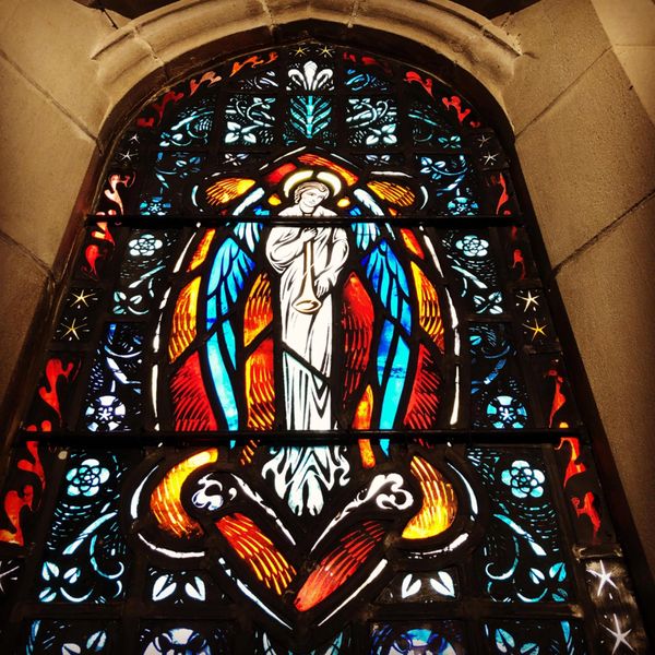 stained glass window with angel