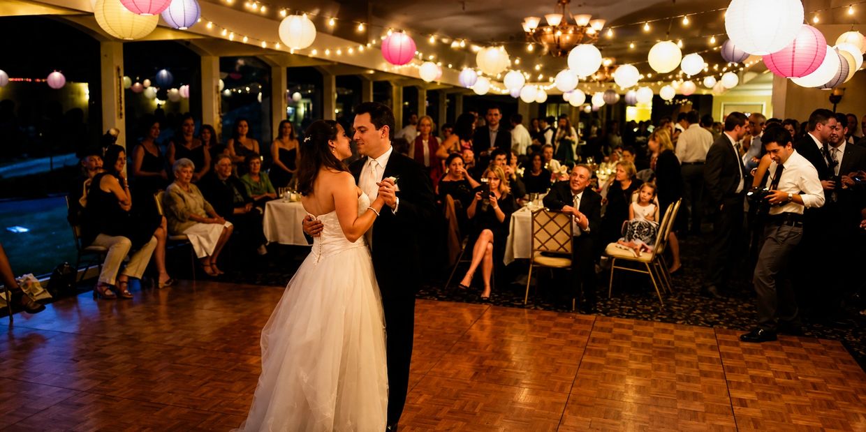 Newly wed couple dancing to wedding music