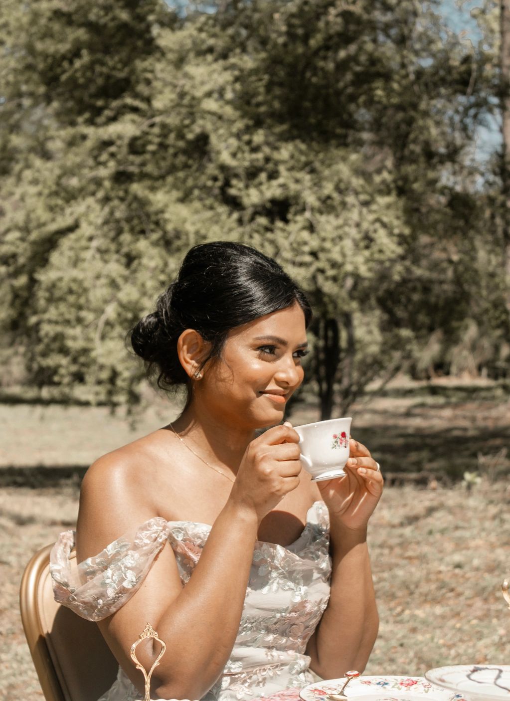 Beautiful bride at her garden bridal shower tea party