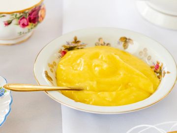 Vintage bowl of lemon curd on tea table