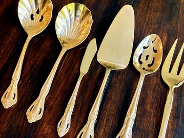 Gold vintage serving pieces available for rent in Wake Forest, NC
