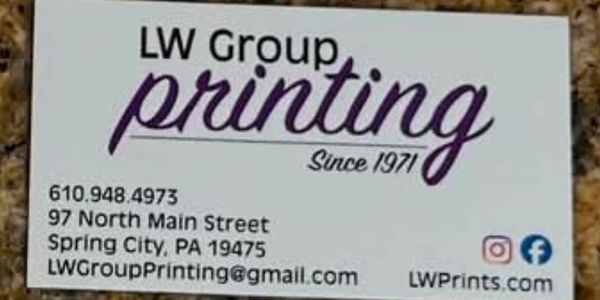 Business card for LW Group Printing with contact details.