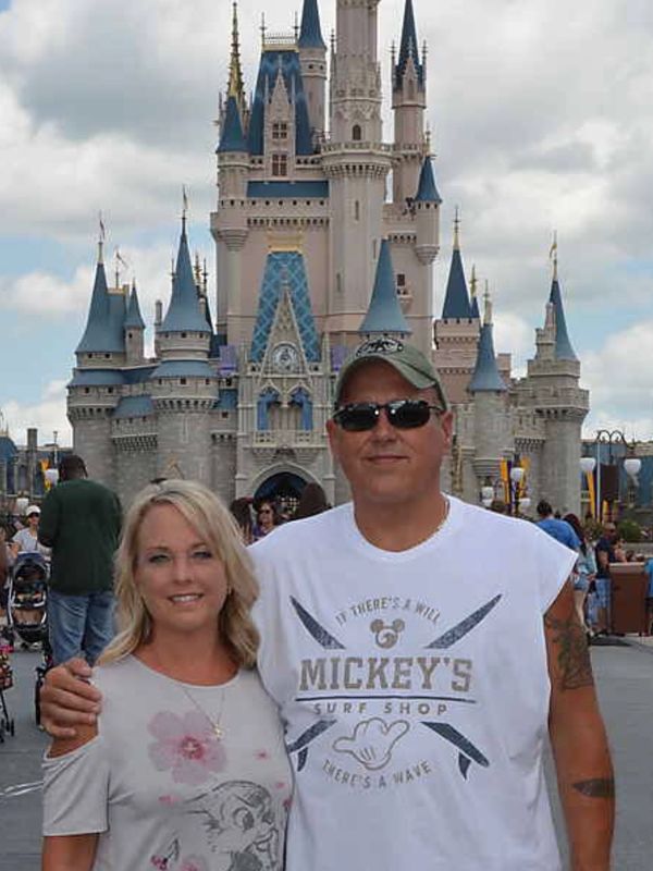 Standing in front of Cinderella's Castle at Walt Disney World Resort