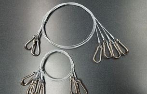 Custom cable assemblies using 7x7 galvanized cable with zinc plated eyelets  and snap hooks.