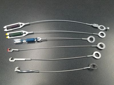 Self adusting brake cable assemblies