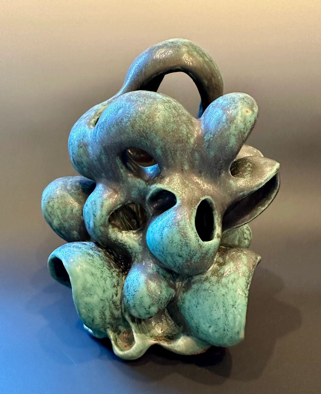 Abstract ceramic sculpture with turquoise glaze