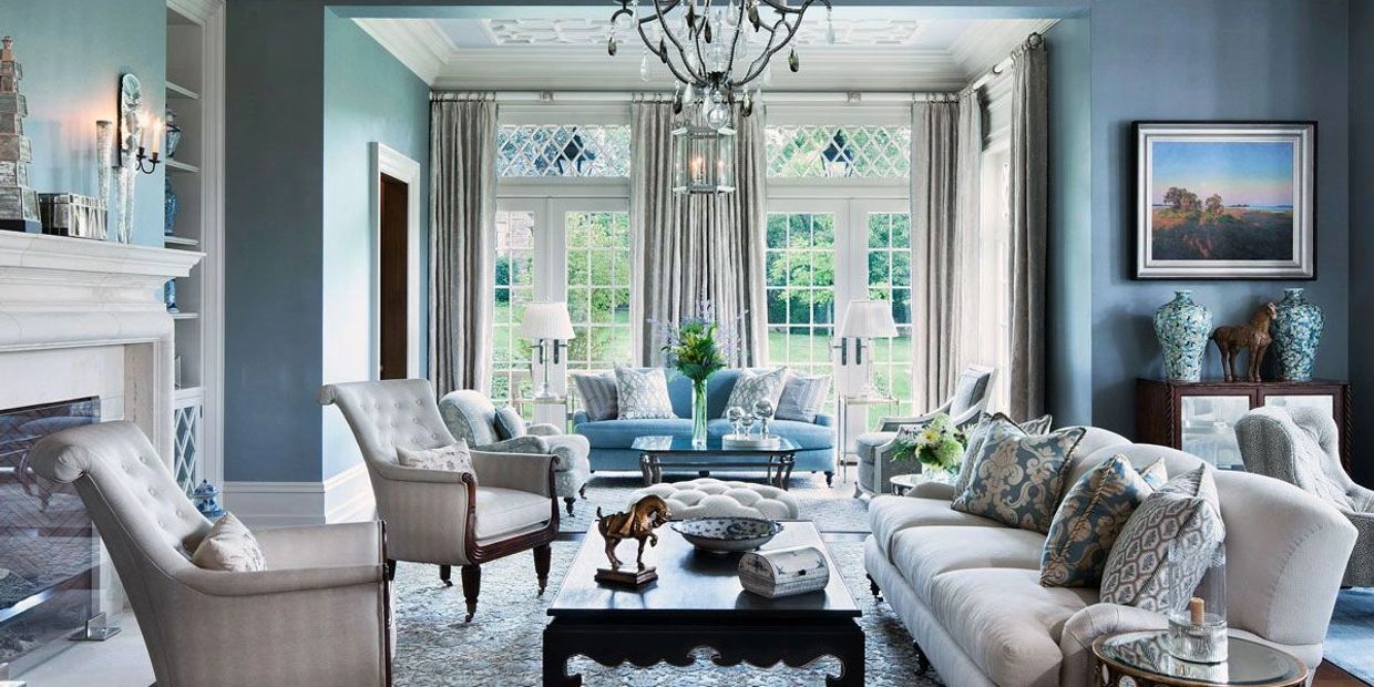 Elegant living room with blue and white decor.