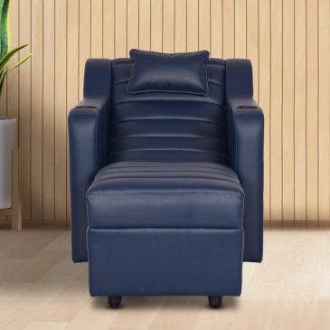 Modern navy blue armchair with matching pillow.