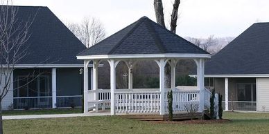 Custom white gazebo in a residential community courtyard built by Full Circle Building Group