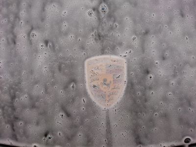 Porsche badge snow-foam wash