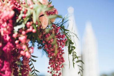 A close-up of the florals and pink berries