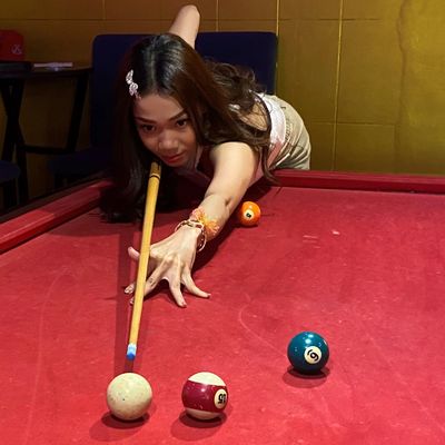 Playing pool with girls in Cambodia