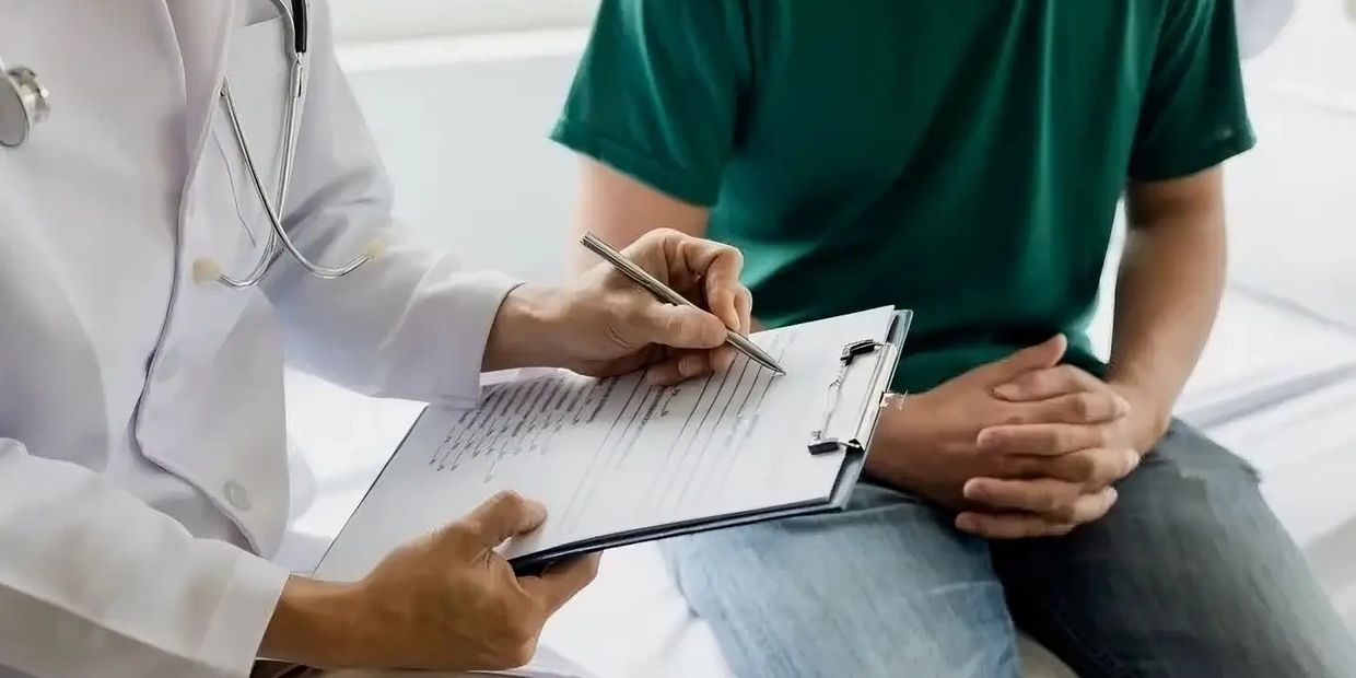 Male health checkup with doctor Doctors consult about diagnosis of male diseases.