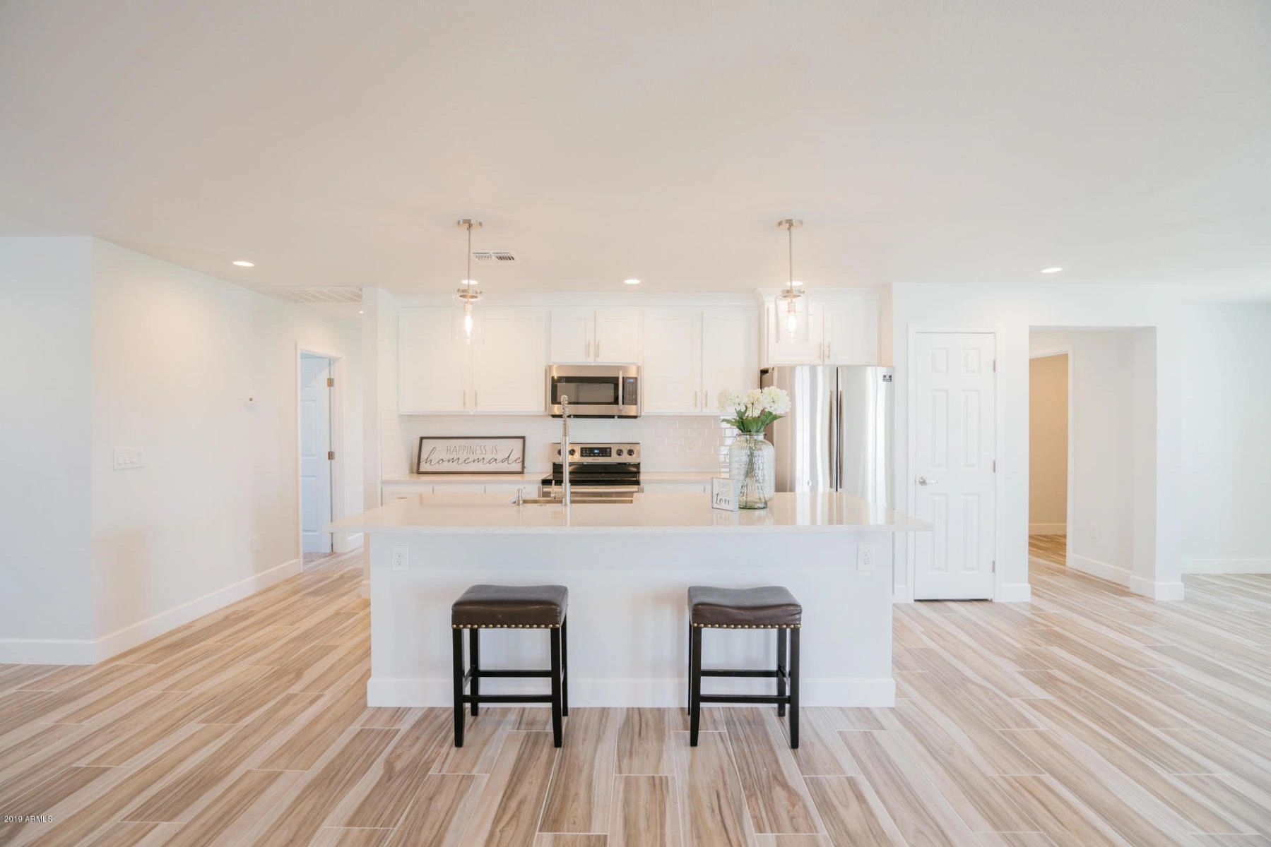 Lucy Guzman Nataly Acosta - Mother/Daughter Real Estate Team